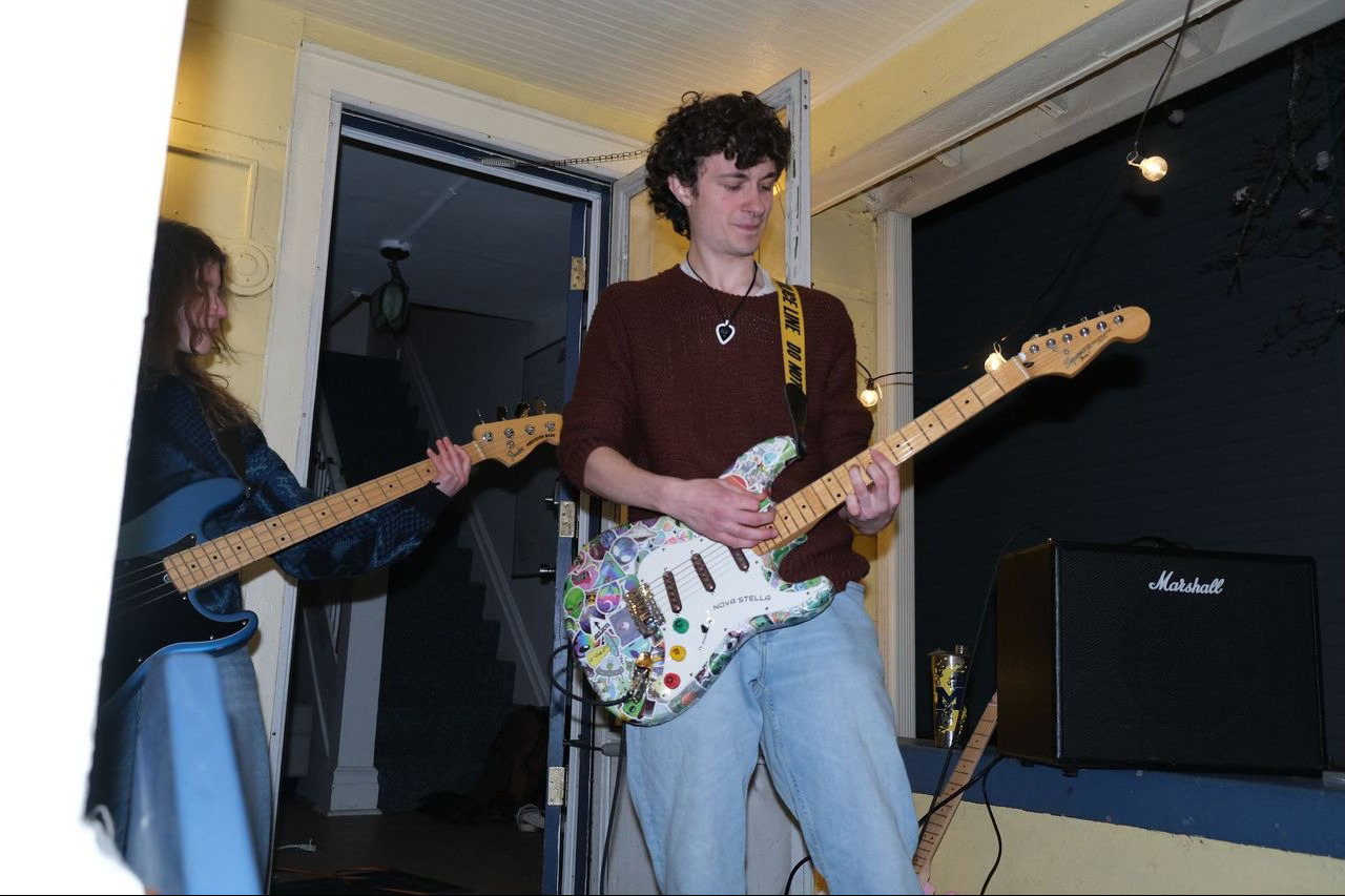 Nathan playing Nova Stella at a college porch concert